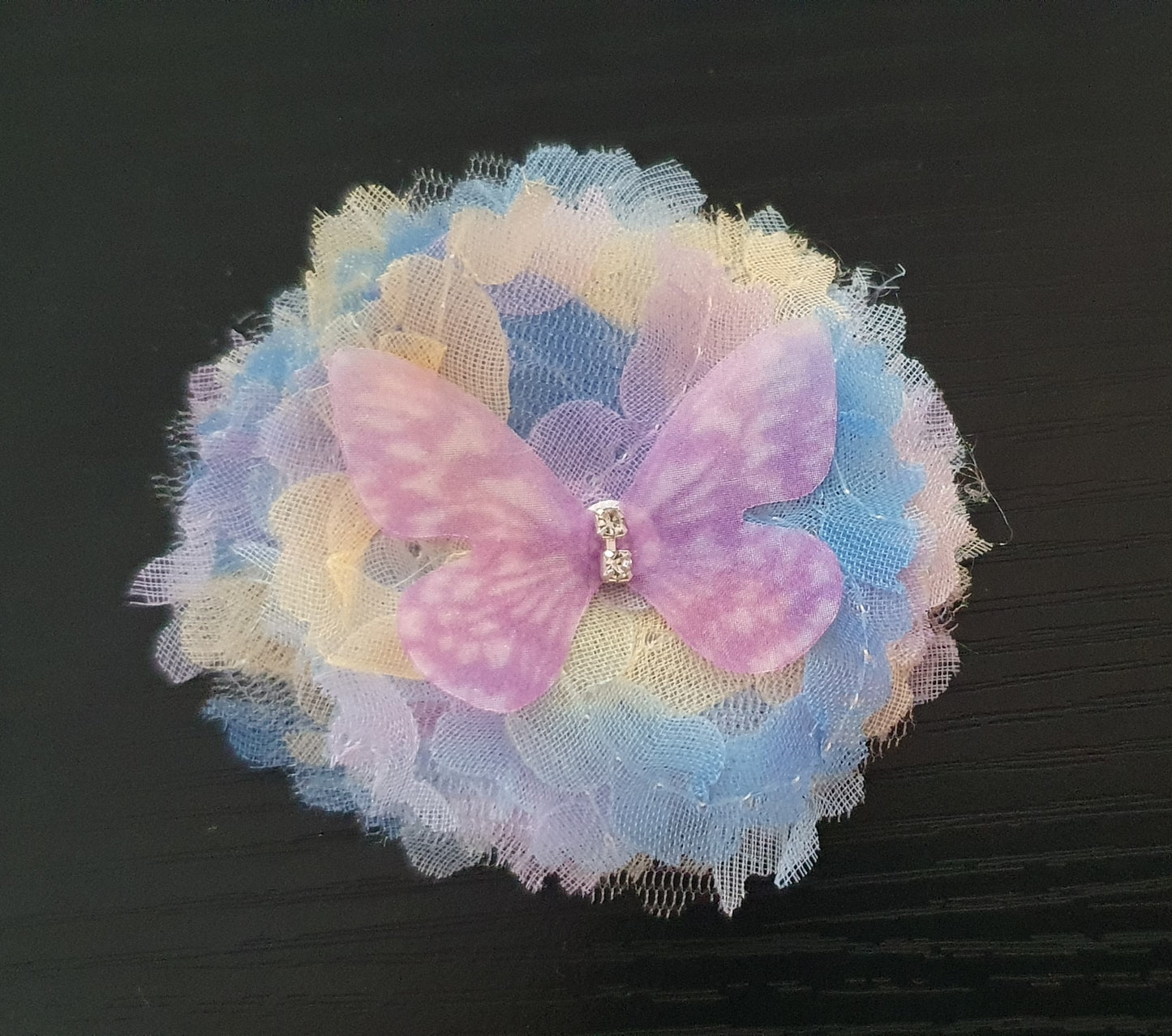 Material flower and butterfly hair clip