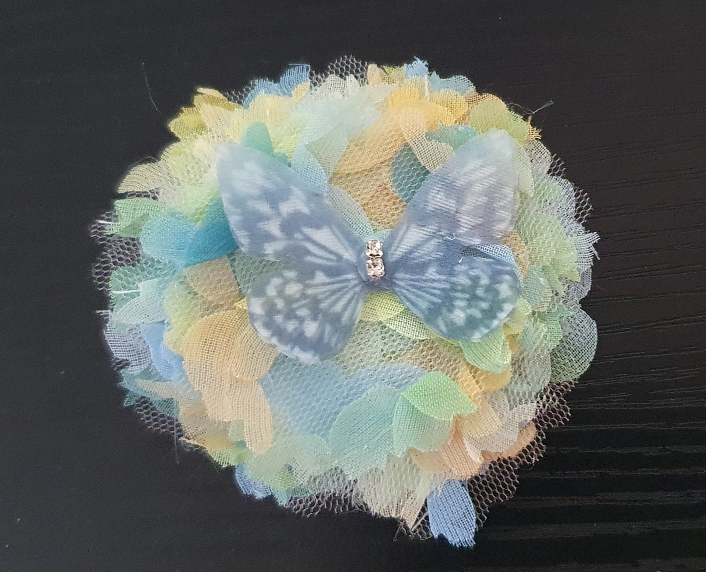 Material flower and butterfly hair clip