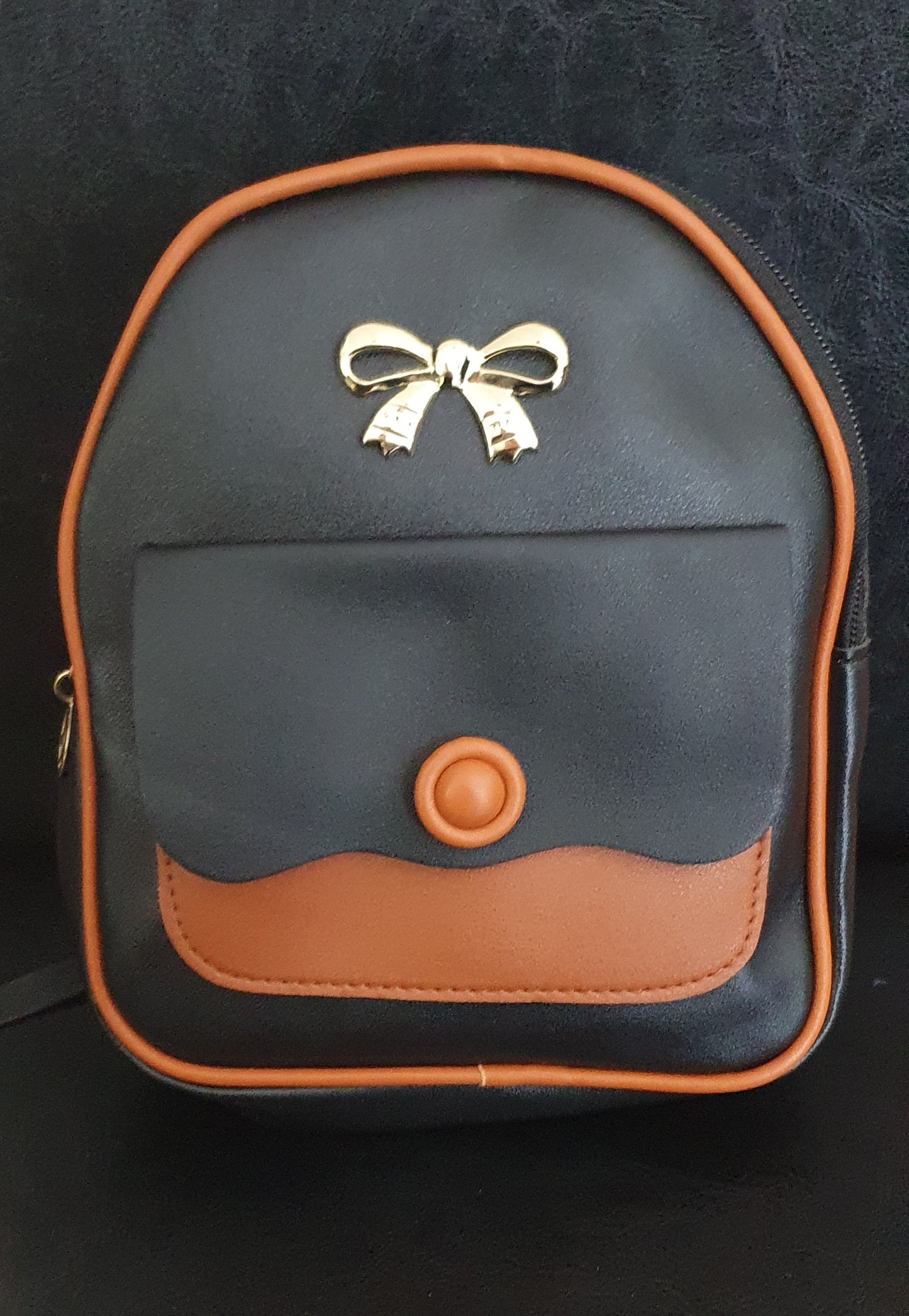 Mini backpack with front pocket