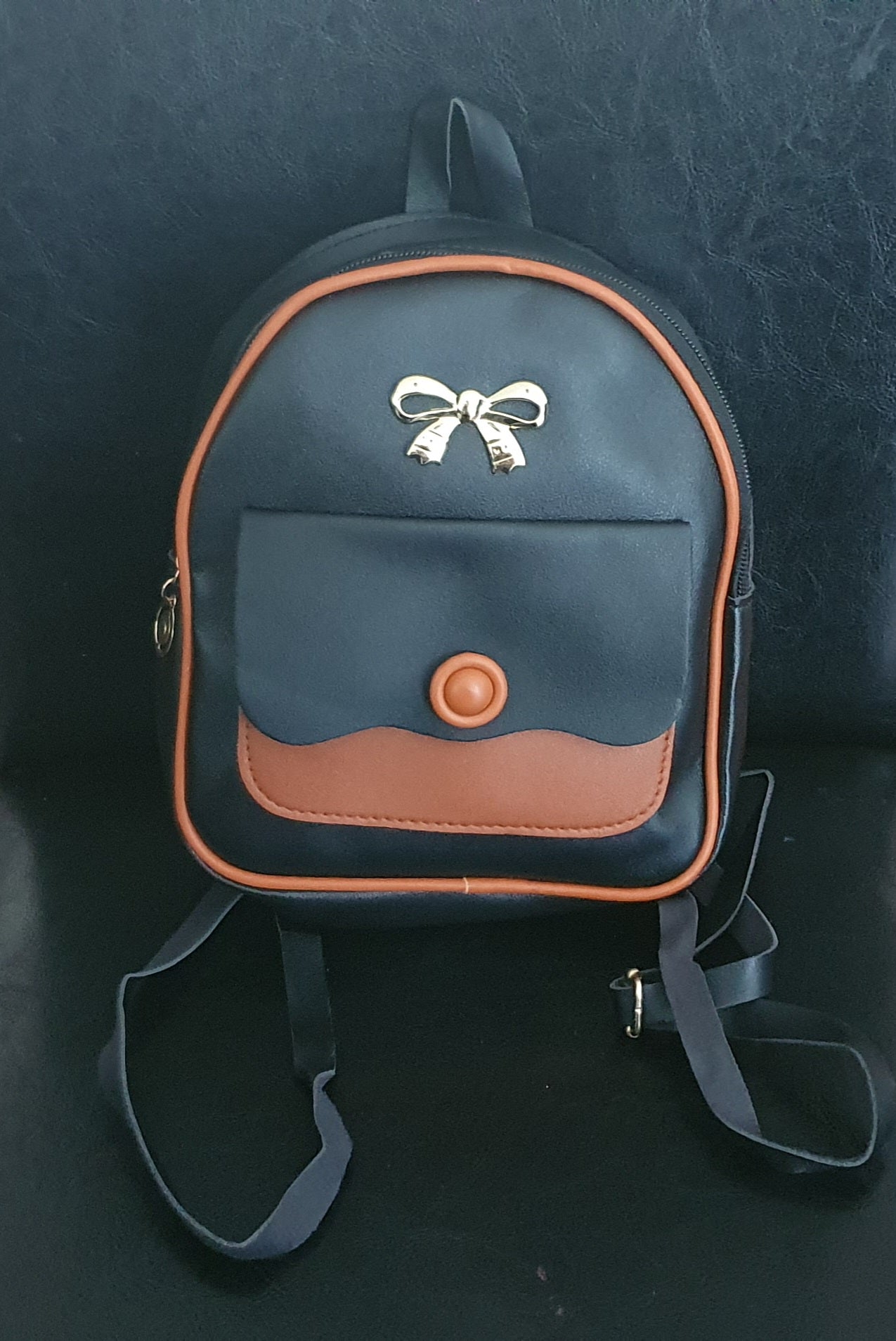 Mini backpack with front pocket