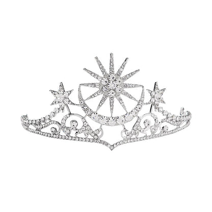 The tiara is silver coloured with clear rhinestone crystals featuring a stunning celestial sun, moon and star theme