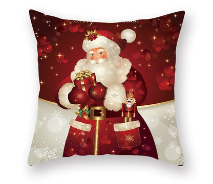 red cream and gold Santa holding a present 