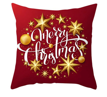 red gold and white cushion cover with stars and baubles saying merry christmas