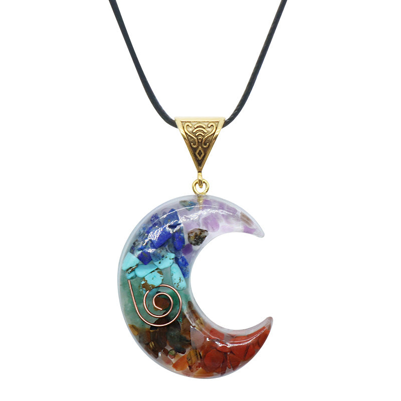 Moon shaped chakra pendant on leather necklace