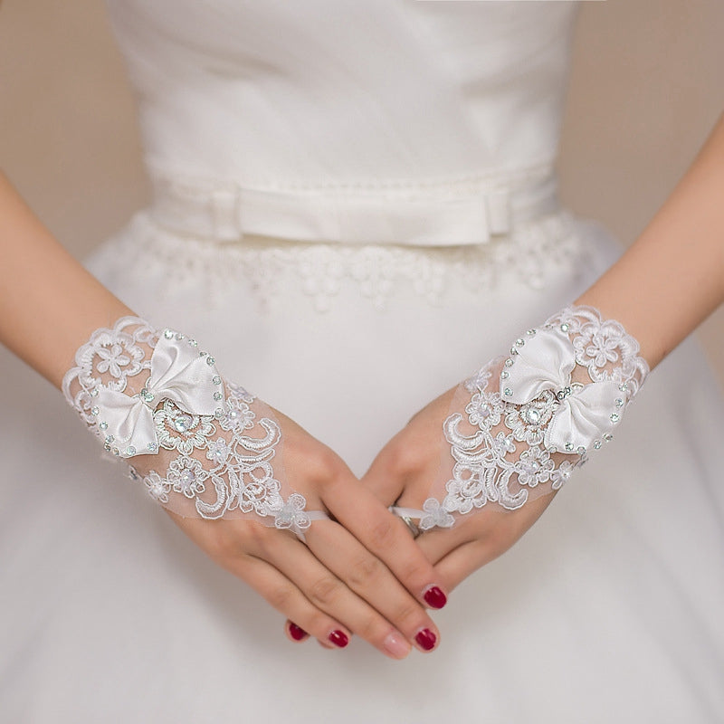 Beautiful white and ivory lace gem applique fingerless gloves with sweet gemmed bow