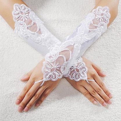 Lace fingerless gloves with faux pearl detail