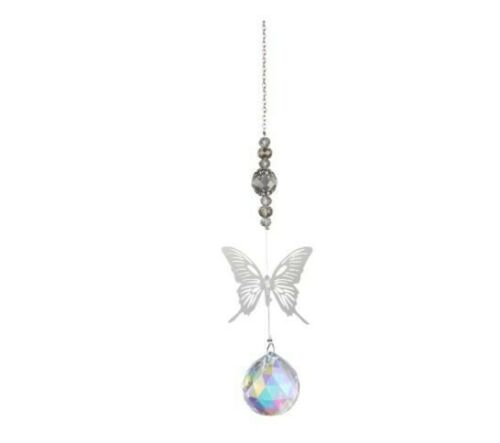 grey beads leading to silver metal butterfly leading to k9 crystal