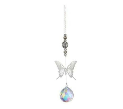 grey beads leading to silver metal butterfly leading to k9 crystal