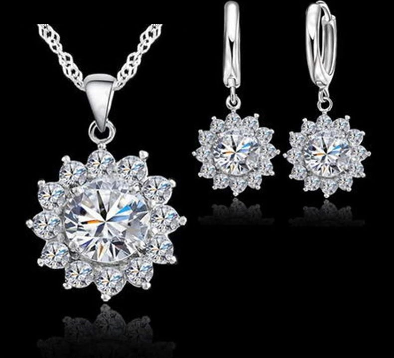 Silver and cubic zirconia sunflower necklace and earring set